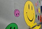 a wall with a drawing of a cartoon character on it