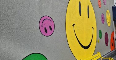 a wall with a drawing of a cartoon character on it