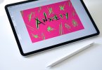 black ipad on white table